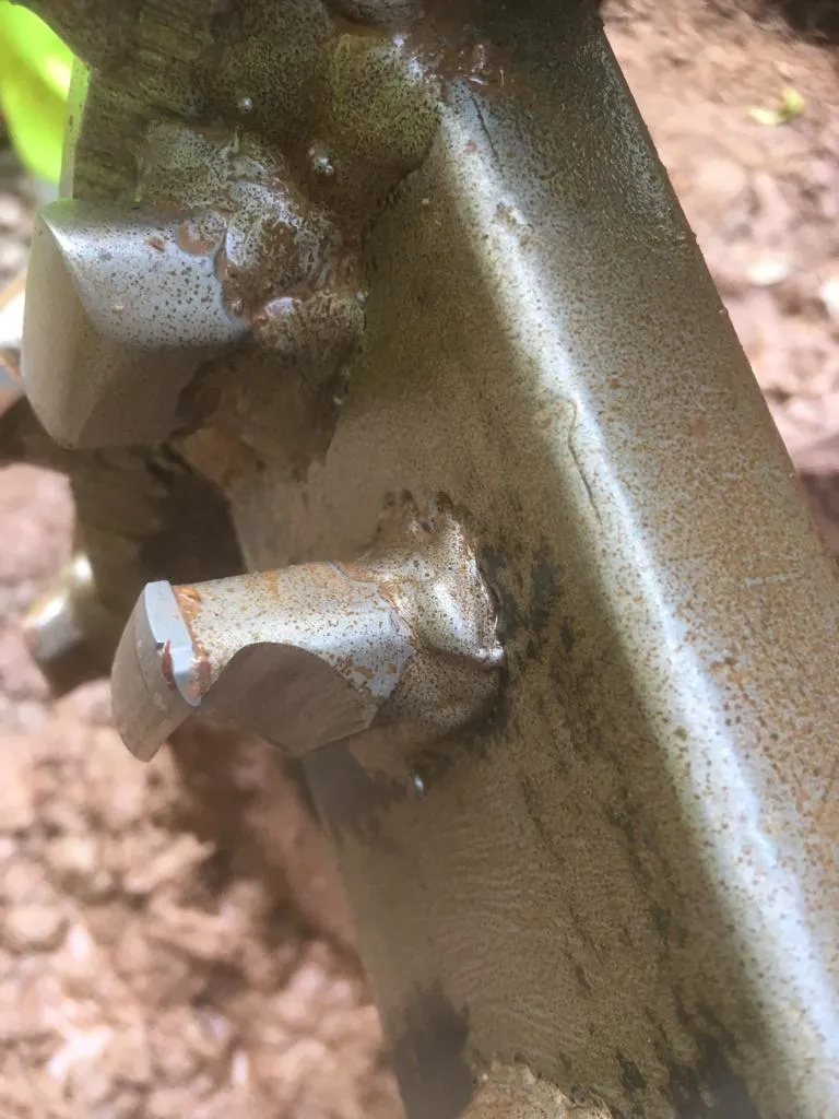 Reamer cutter worn flat after grinding against buried metal in the Hopton bore